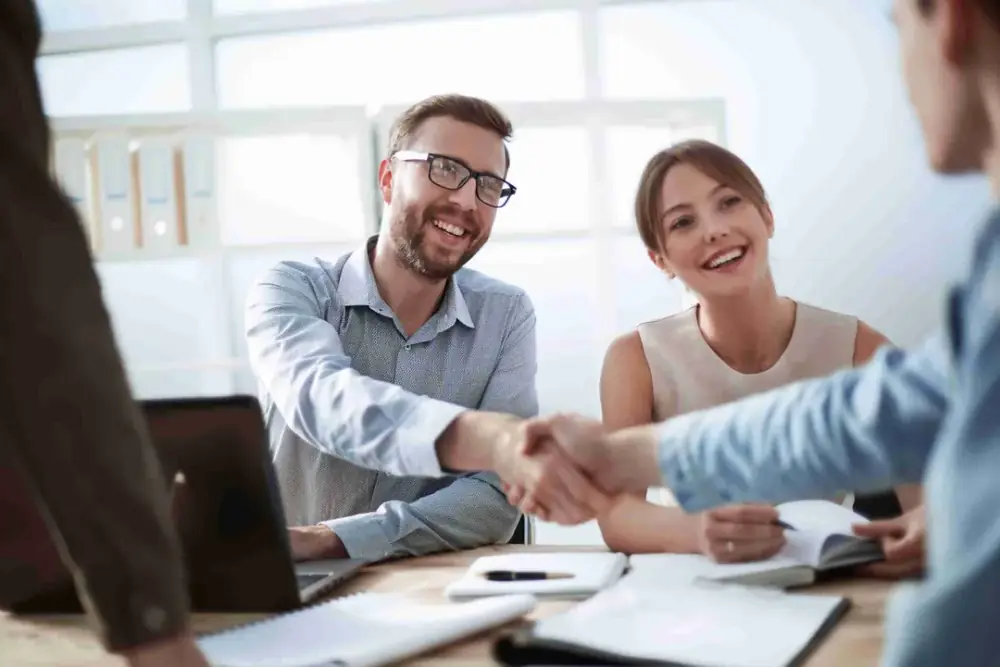Prakat team members collaborating in a meeting